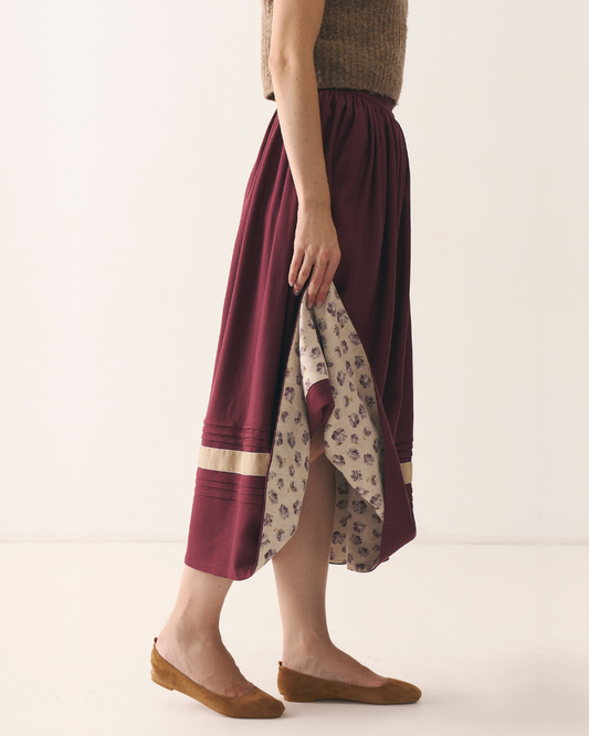 спідниця з підбоєм бордового кольору