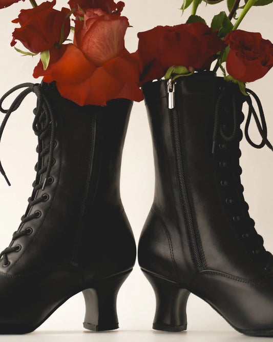 Black vintage lace-up boots with red roses inside, traditional Ukrainian style