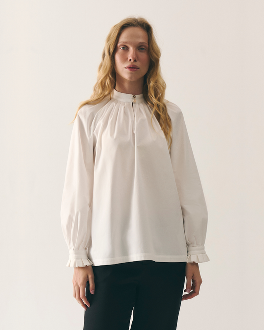 Біла блузка жіноча